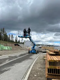 Workers On Training Machine