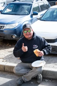 Worker Happily Enjoying Meal